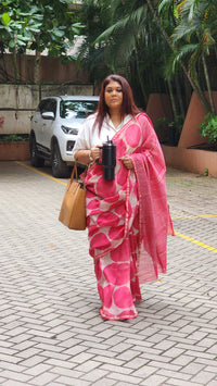 Pink chanderi cotton silk saree with white Bagru handblock motifs and zari border, light and festive handcrafted drape
