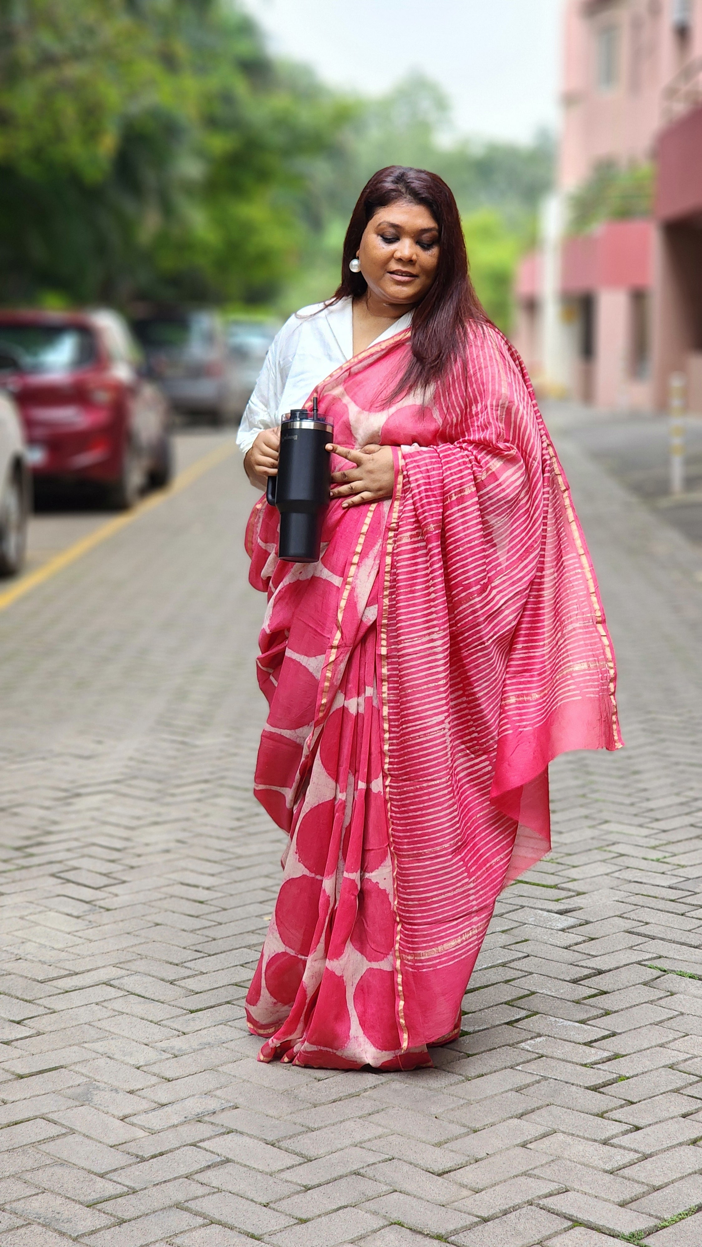 Pink chanderi cotton silk saree with white Bagru handblock motifs and zari border, light and festive handcrafted drape