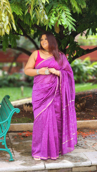 Purple Chanderi silk–cotton saree with white Bagru handblock prints and zari border, handcrafted in Rajasthan