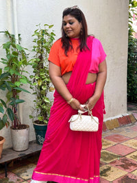 Pink mull cotton saree with gold border – playful soft cotton drape from RURIethnic.