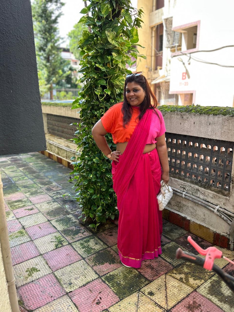 Pink mull cotton saree with gold border – playful soft cotton drape from RURIethnic.