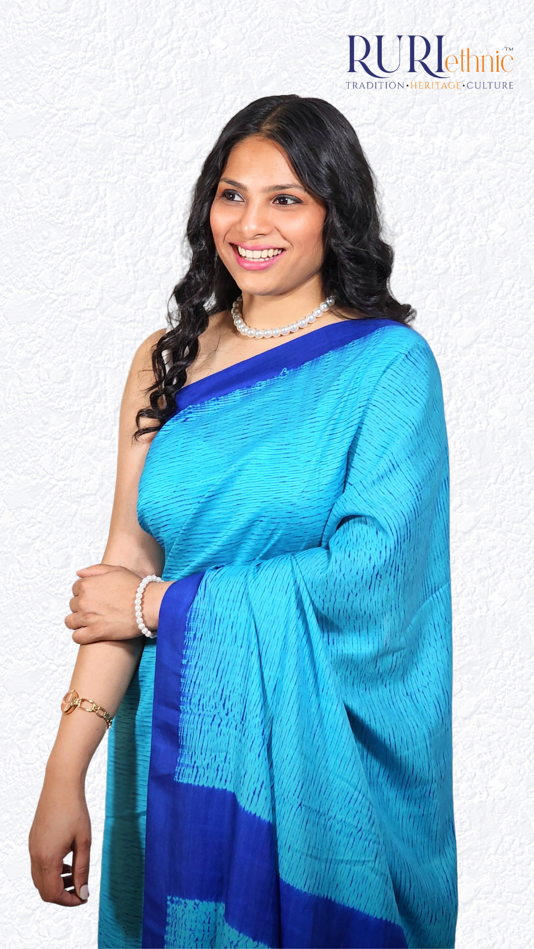 Shibori dye pattern detail on blue pure silk saree