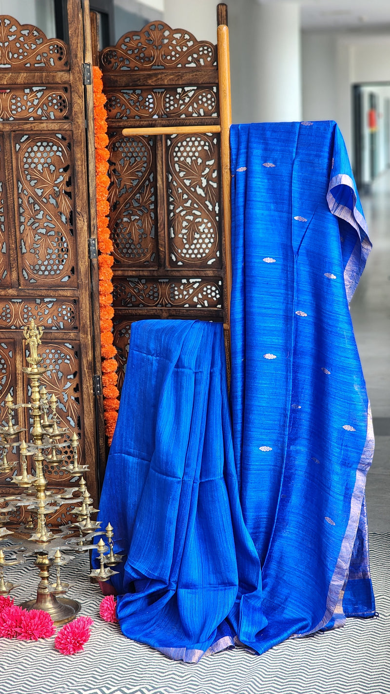 Royal blue matka silk saree with silver zari border.