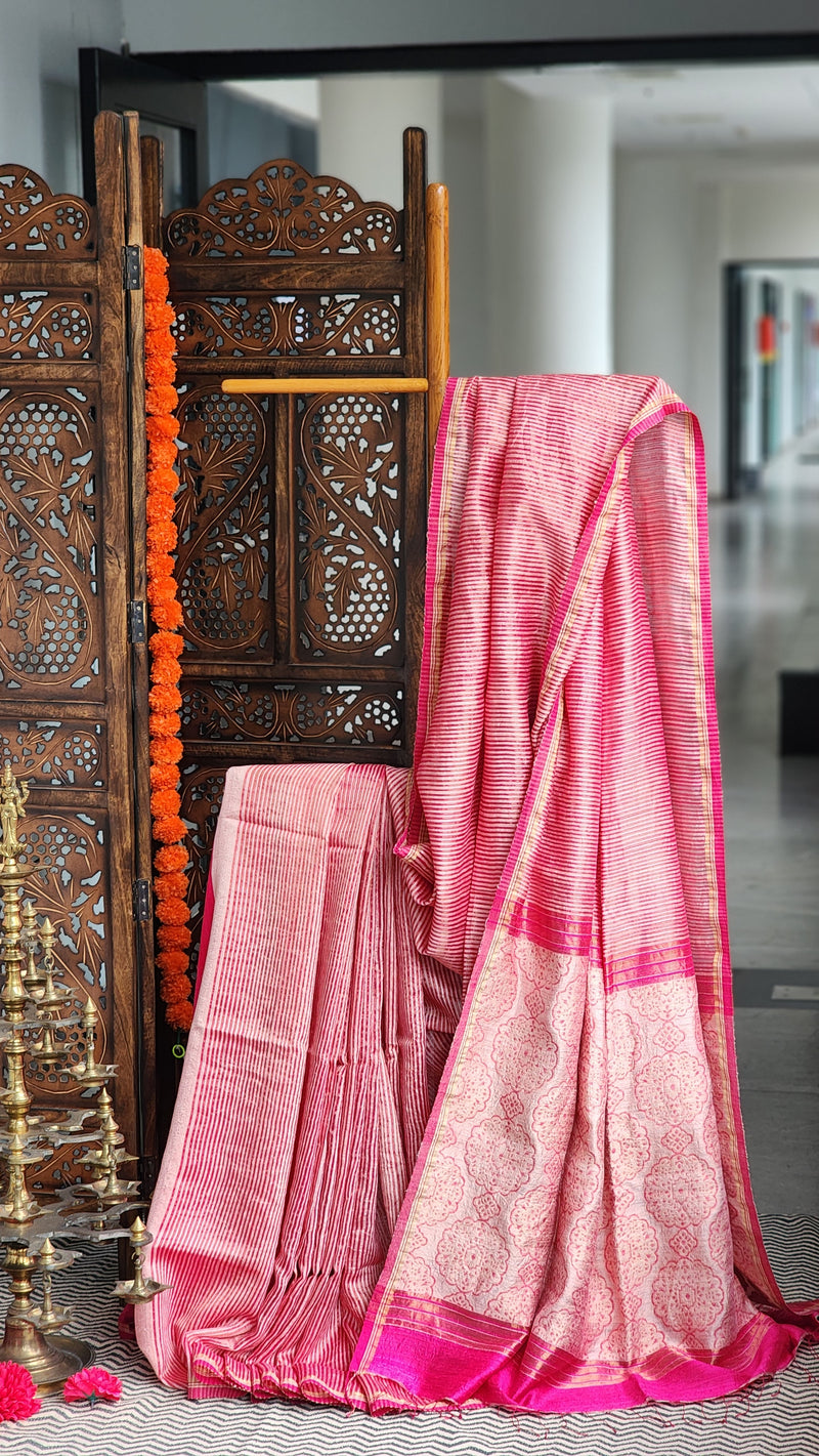 Rose pink matka silk saree with zari border.