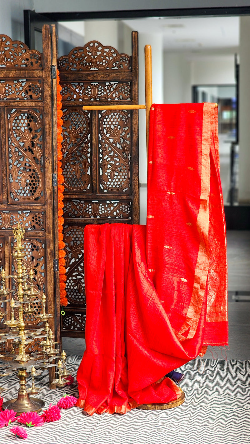 Fiery red matka silk saree with gold zari border from RURIethnic’s Mohana collection.