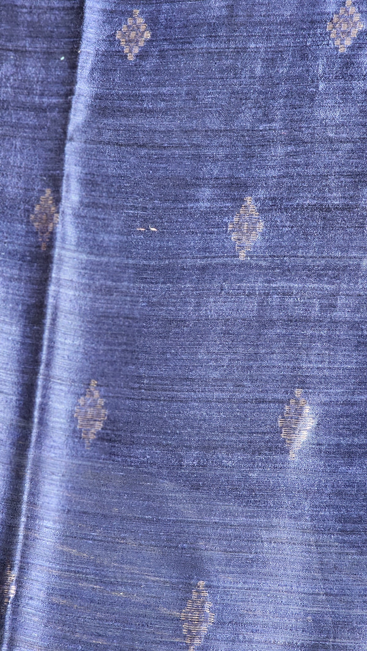 Deep blue matka silk saree with silver zari border.