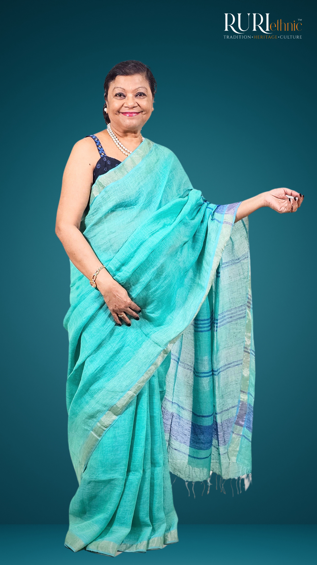 Vine motif detail on light green linen saree