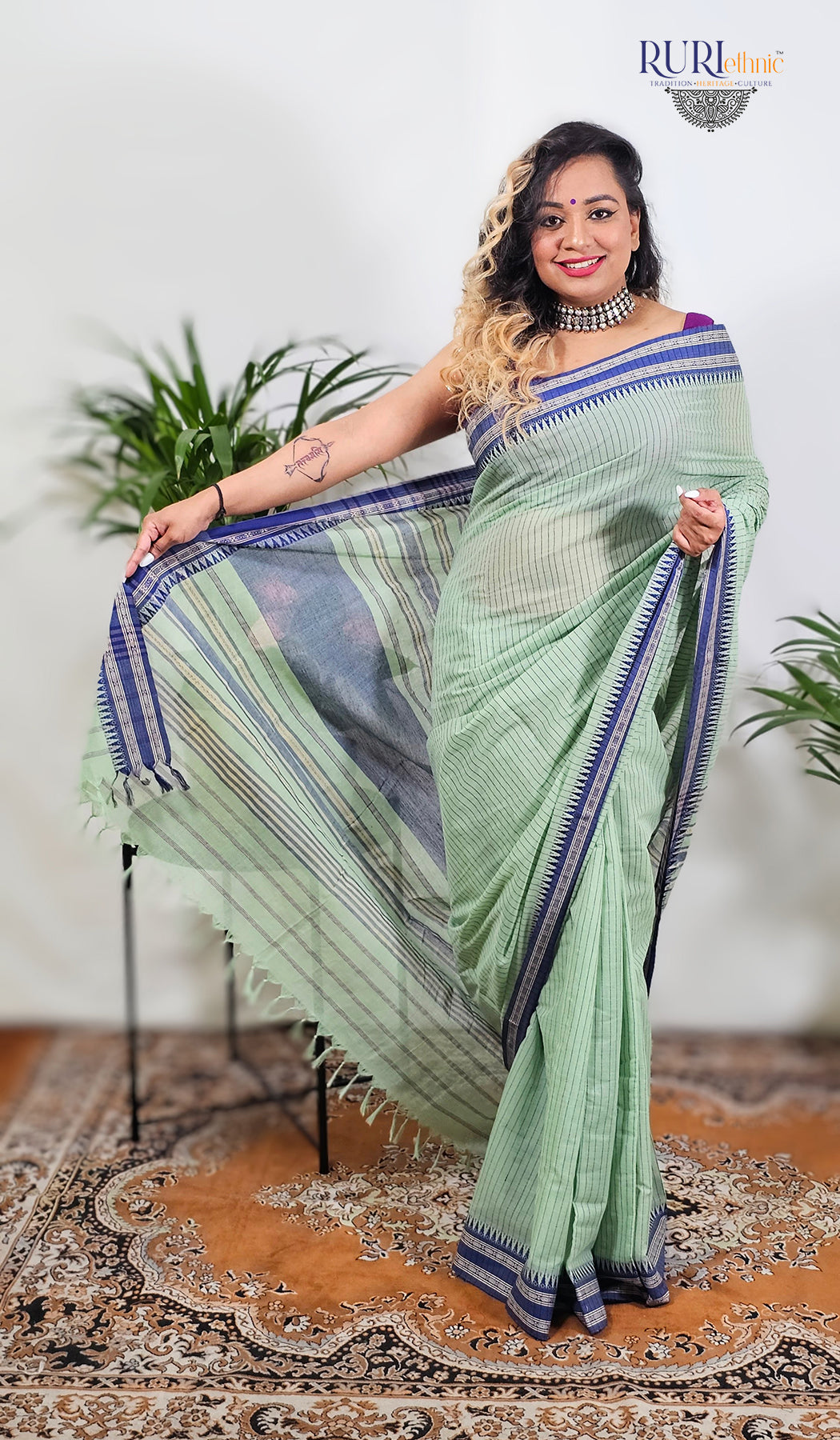 Lightweight green cotton saree for summer workdays