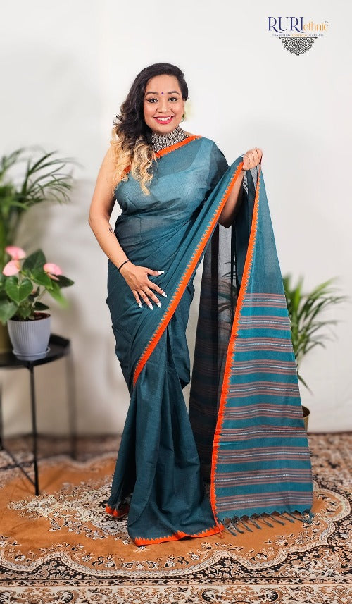 Plain green cotton handloom workwear saree with orange temple border