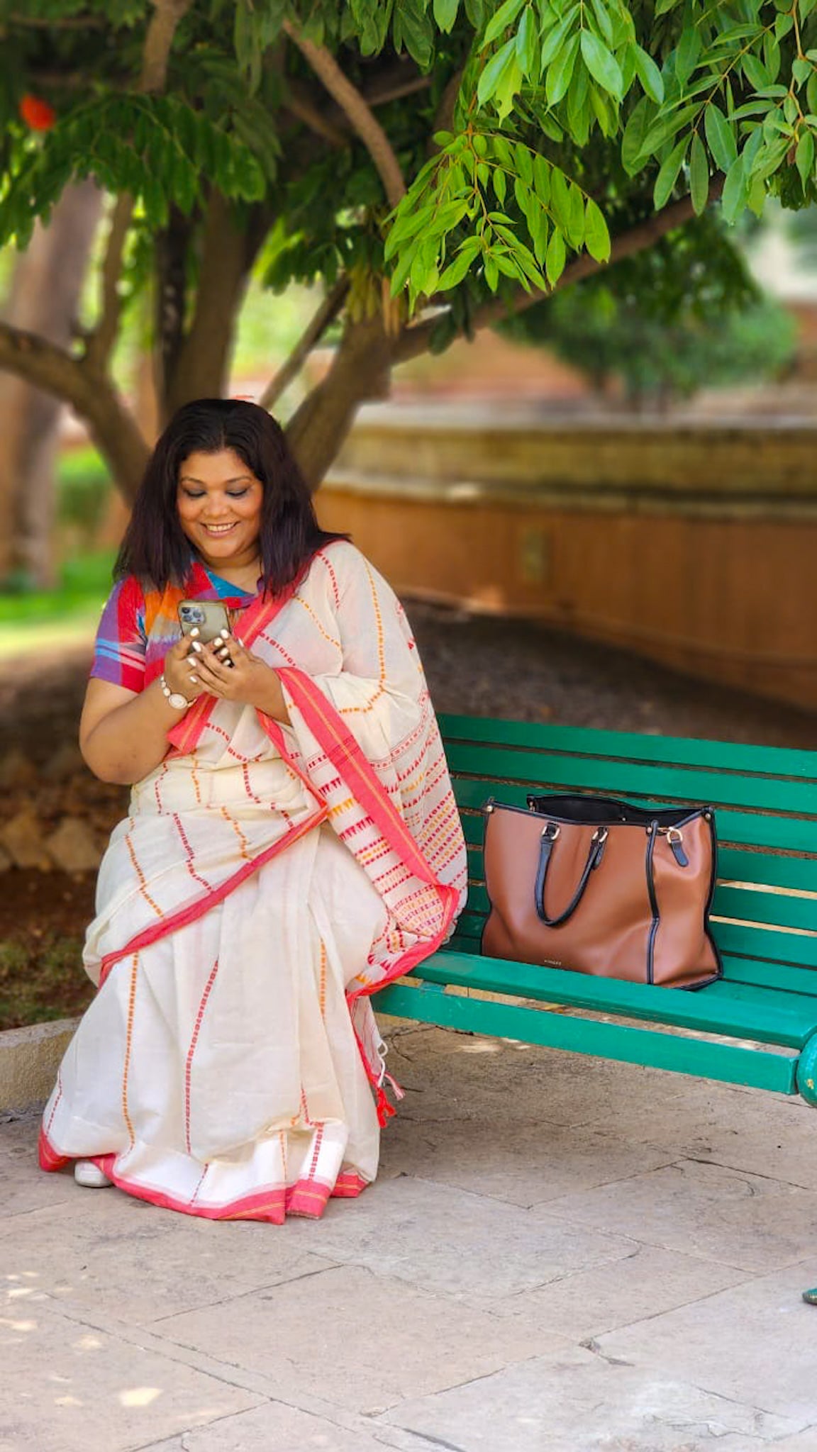 White cotton saree with colourful handwoven stripes playful summer drape from RURIethnic.