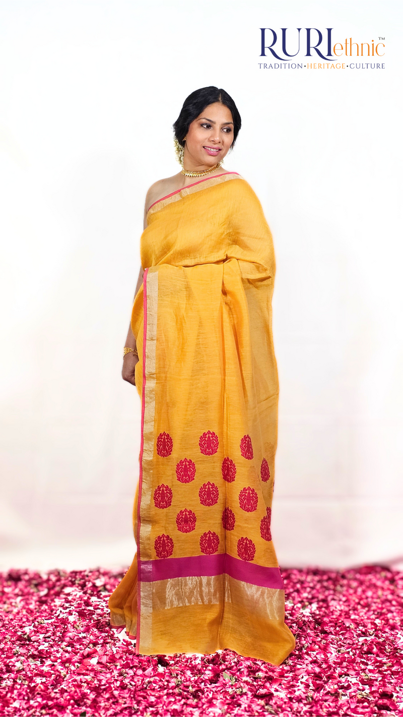 Mango yellow silk linen handloom saree with pink woven pallu